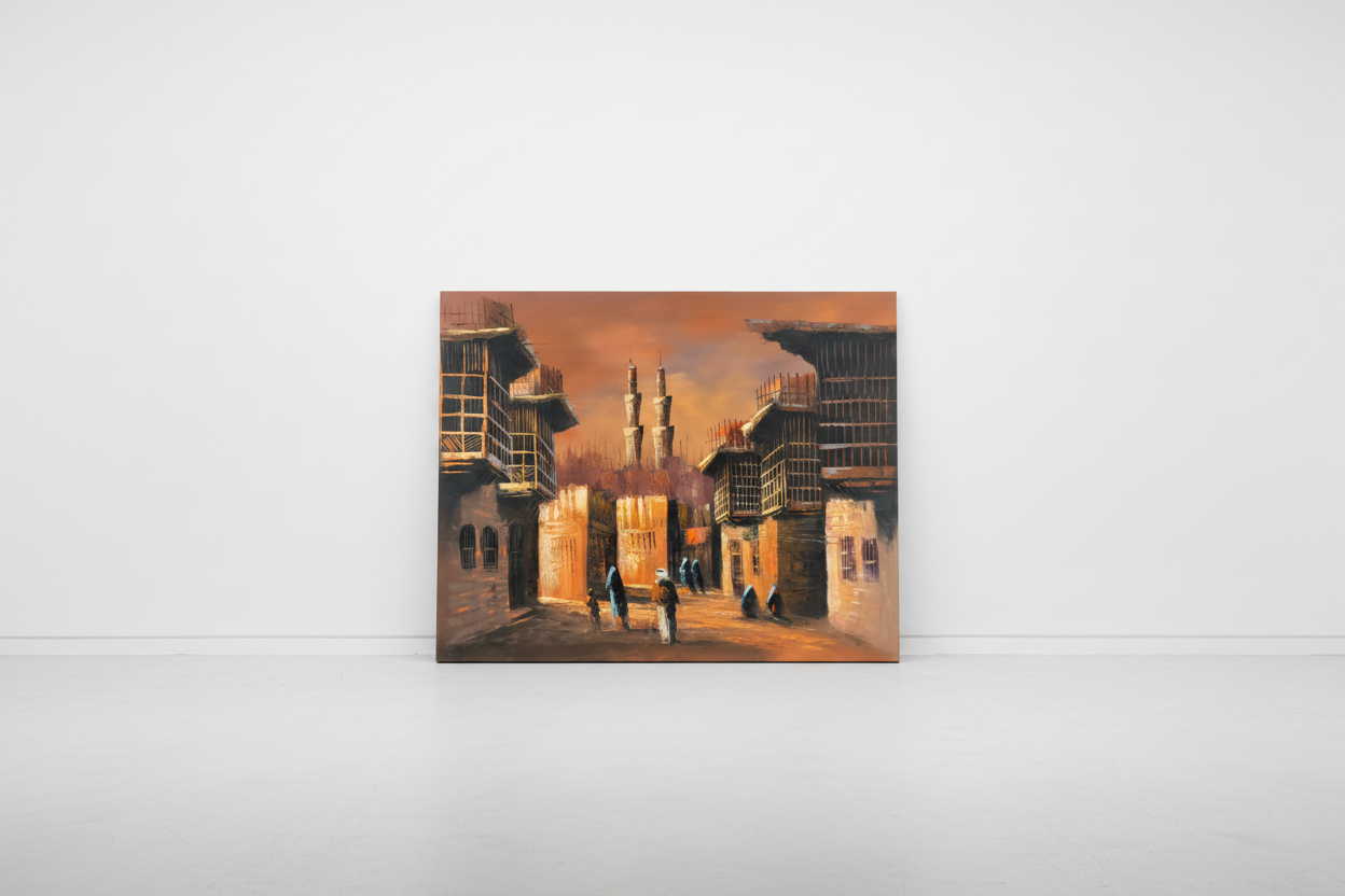 Original Middle Eastern street scene oil painting leaning against a white gallery wall — frameless canvas display