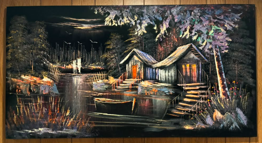 Lakeside cabin night scene canvas wall art – original painting with rustic wooden cabins, glowing orange windows, rowboat, fishing net, pine trees, birds in flight, and moonlit sky