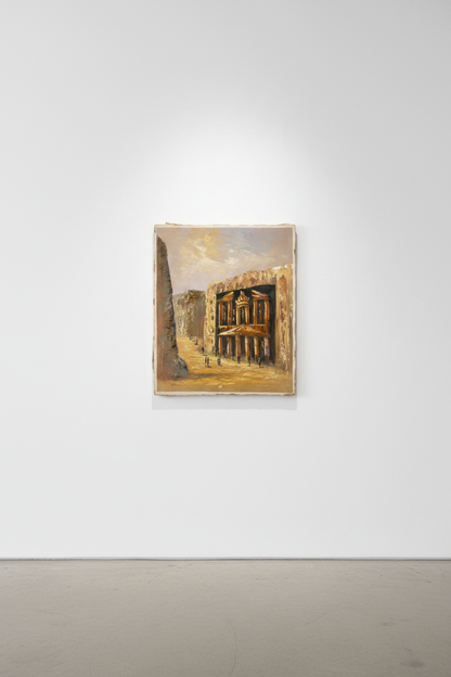 Treasury of Petra oil painting hung on clean empty white gallery wall, no frame, soft directional spotlight shadow