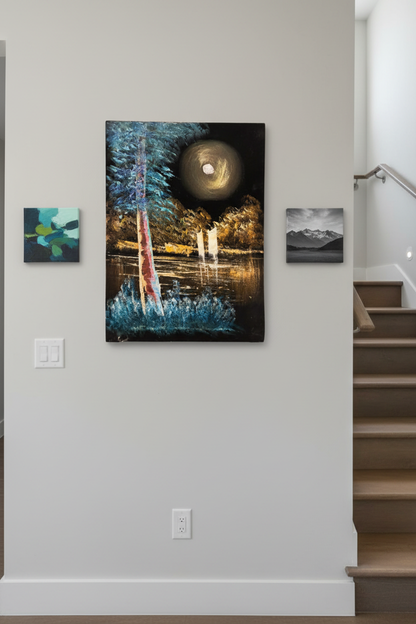 Giant full moon forest lake canvas art displayed on staircase gallery wall in modern home lifestyle photo