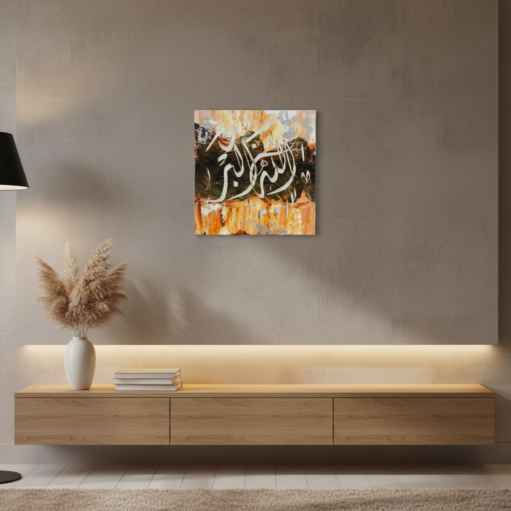 Allahu Akbar fiery gold calligraphy canvas displayed above a wooden console stand in a warm modern interior