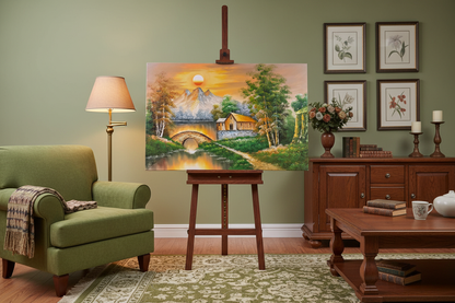 Original countryside sunset oil painting on wooden easel stand in a warm traditional living room, unframed canvas at correct scale