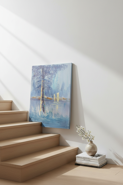 Misty lakeside painting leaning against wall near stairs in luxury home interior