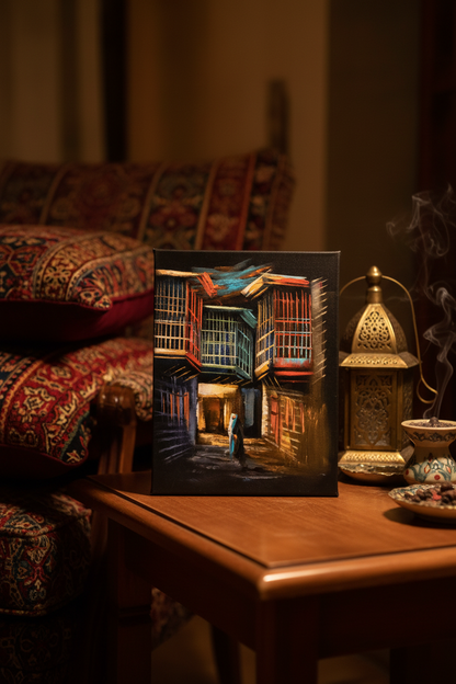 Arabian old city alley night canvas art propped on wooden shelf in cozy Middle Eastern inspired interior lifestyle photo