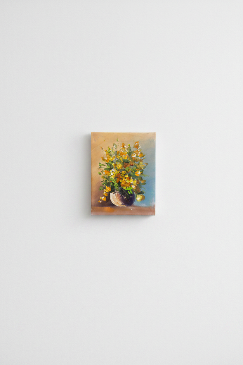 Original yellow floral bouquet impasto oil painting displayed unframed on clean empty white wall