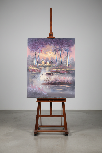 Twilight lake cabin original oil painting displayed on a wooden easel art stand — frameless gallery presentation