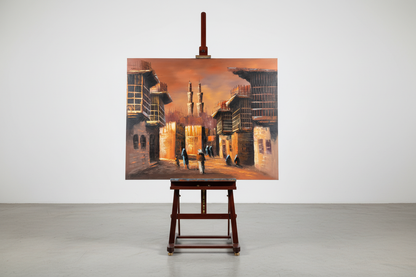Minaret at Dusk original oil painting displayed on a wooden easel art stand — frameless gallery presentation