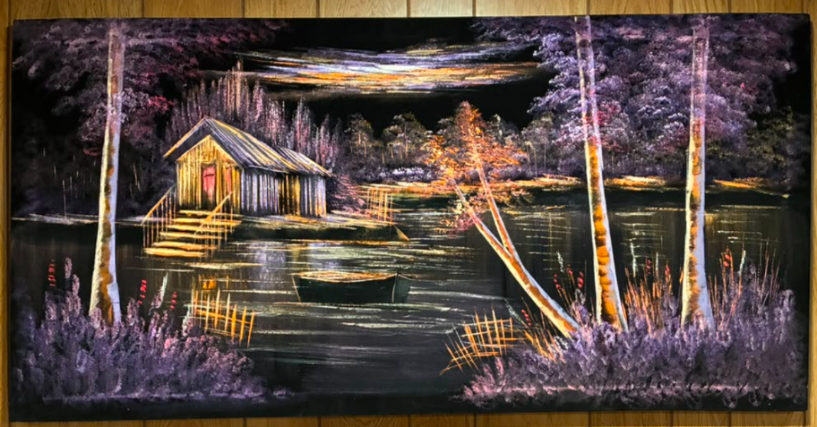 Purple and gold lakeside cabin night scene canvas wall art – original painting with glowing boathouse, rowboat, birch trees, lavender wildflowers, and water reflections
