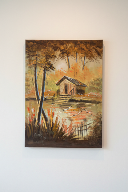Original oil painting hung centered on a clean empty white interior wall, no frame, canvas only